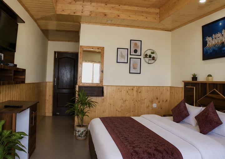 Room entrance with artwork and wood panelling